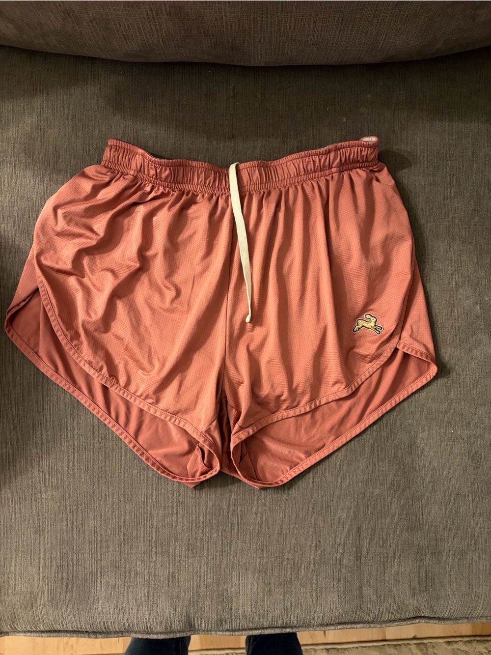 Tracksmith women’s twilight split shorts size M rose wood / coral color